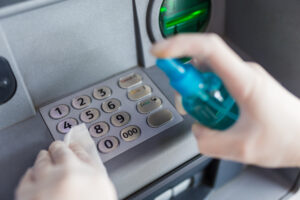 Professional Cleaning a ATM keypad and sanitizing it
